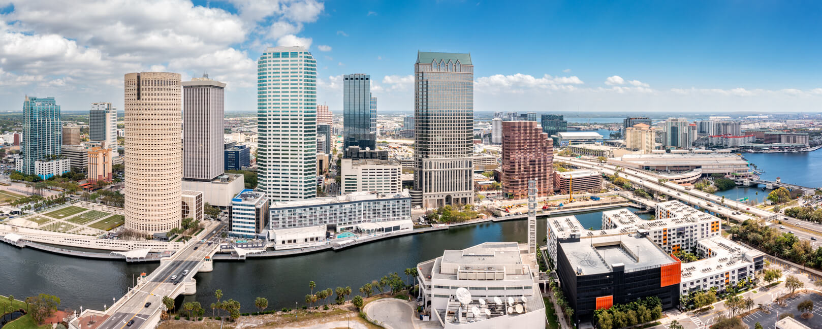 Aerial panorama of Tampa, Florida skyline. Our commercial real estate agency is located in Downtown Tampa.