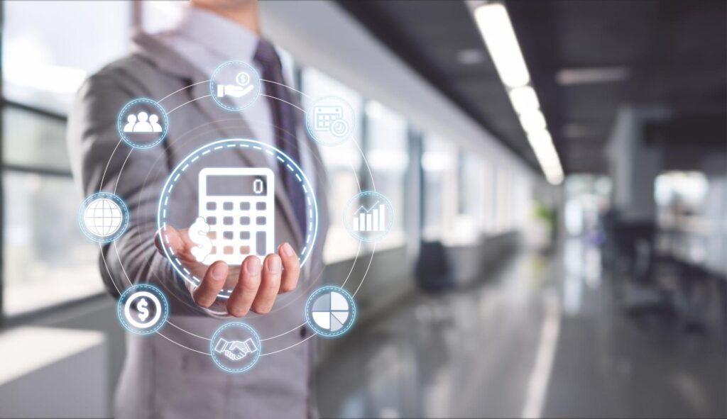 Corporate professional analyzing financial details with a digital calculator, highlighting the role of lease abstracts in financial planning for commercial real estate.