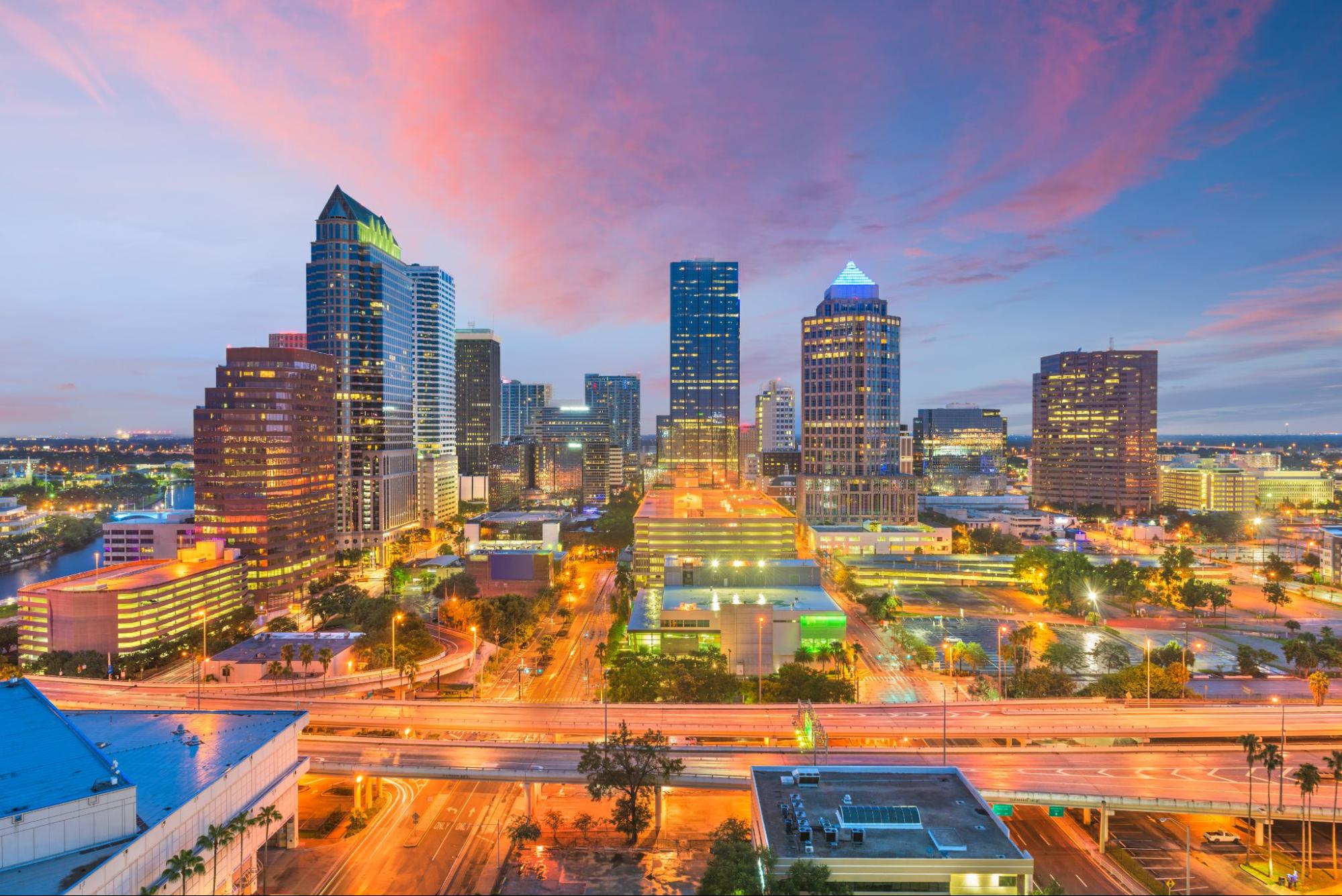 Vibrant Tampa skyline at night, highlighting the city's thriving commercial real estate market.