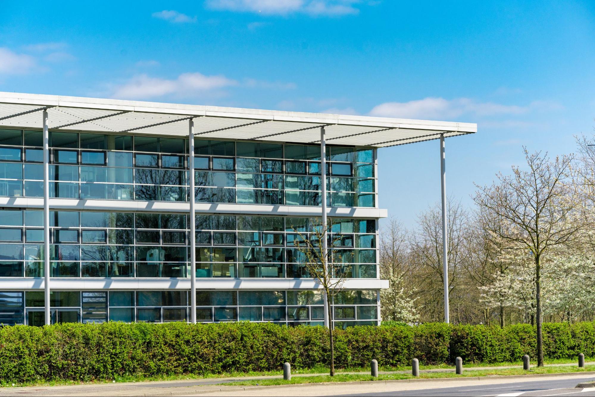 Three-story commercial office building, highlighting the importance of lease abstracts in managing commercial real estate effectively.