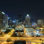 Tampa city skyline at night, showcasing the vibrant commercial real estate landscape.