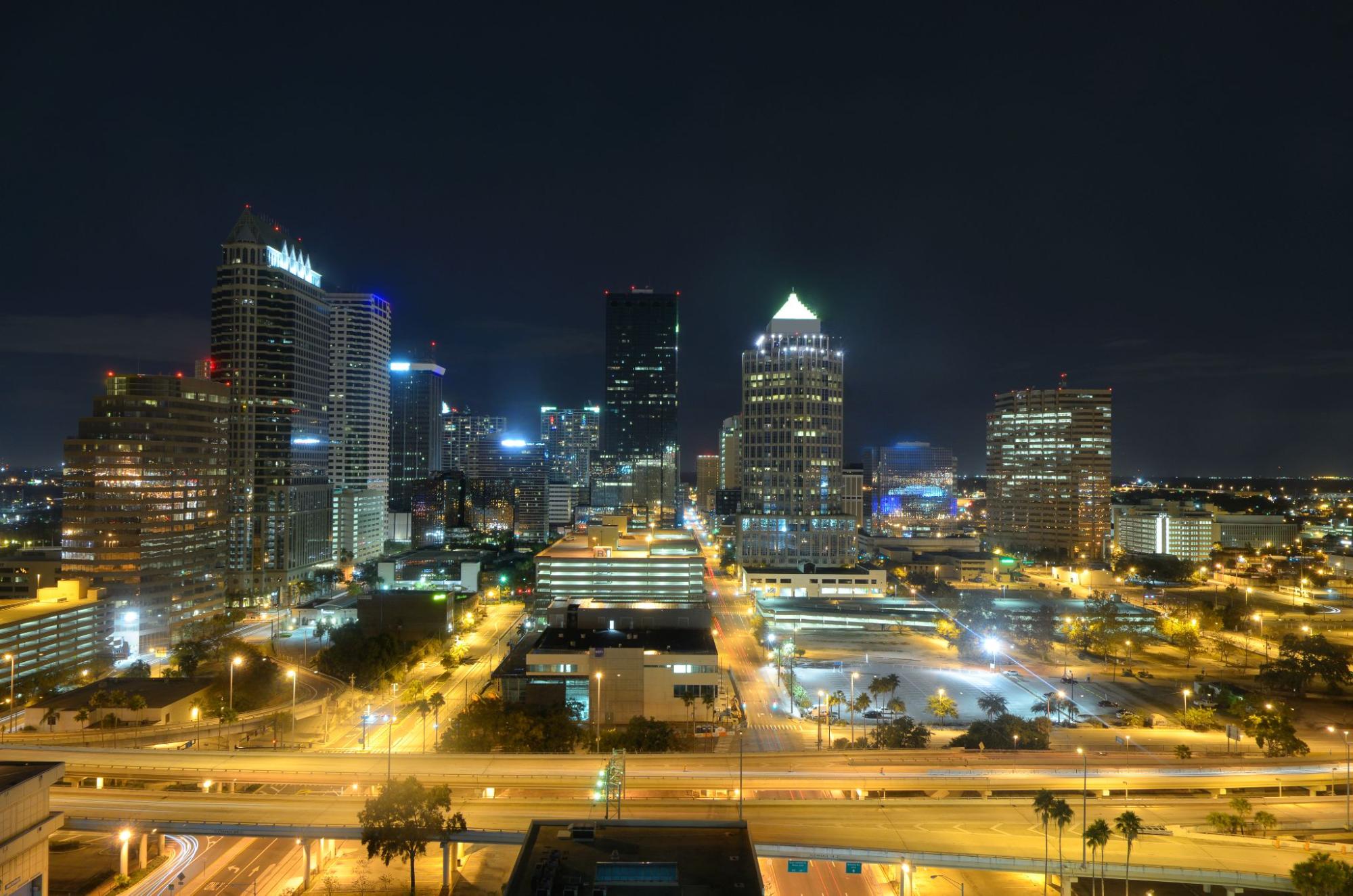 Tampa city skyline at night, showcasing the vibrant commercial real estate landscape.