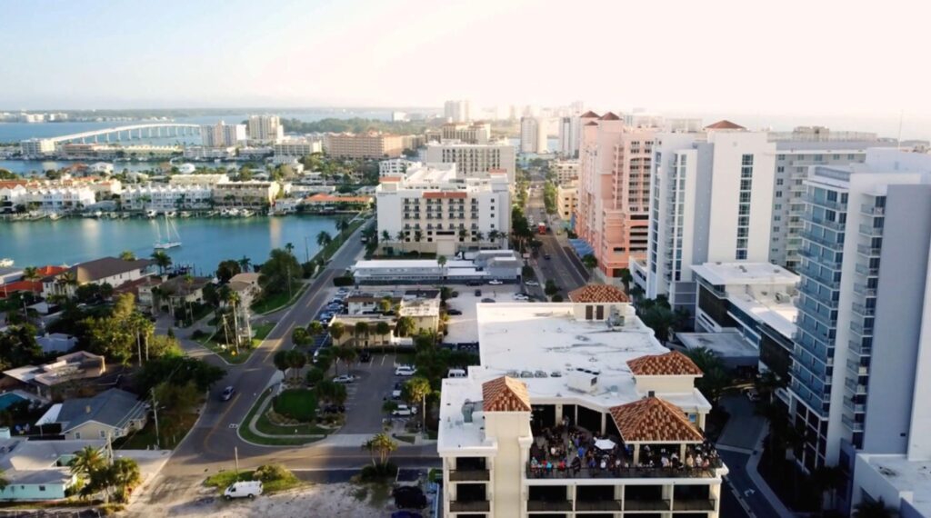 Clearwater Beach shops and restaurants filled with visitors enjoying the sunny atmosphere