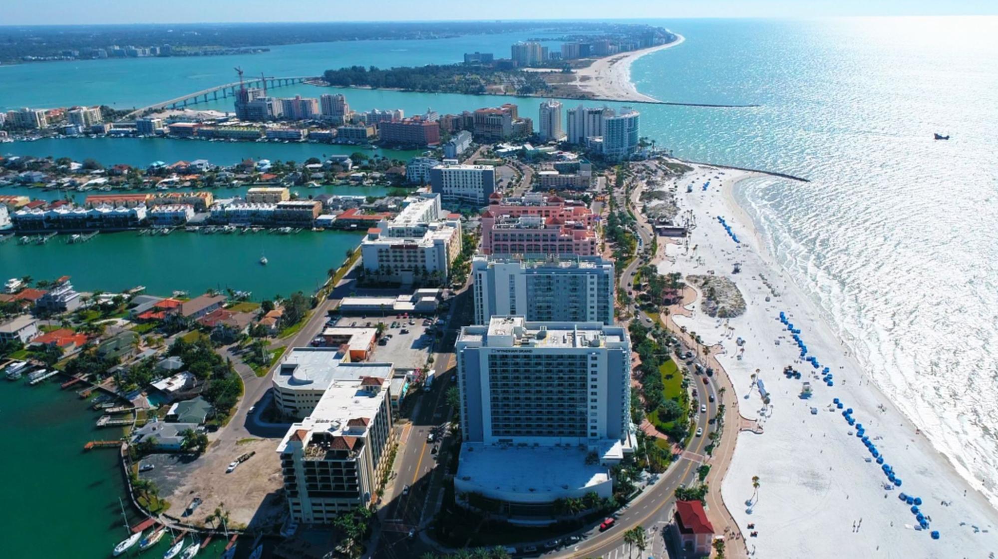 Aerial view of Clearwater’s commercial skyline with the coast in the background