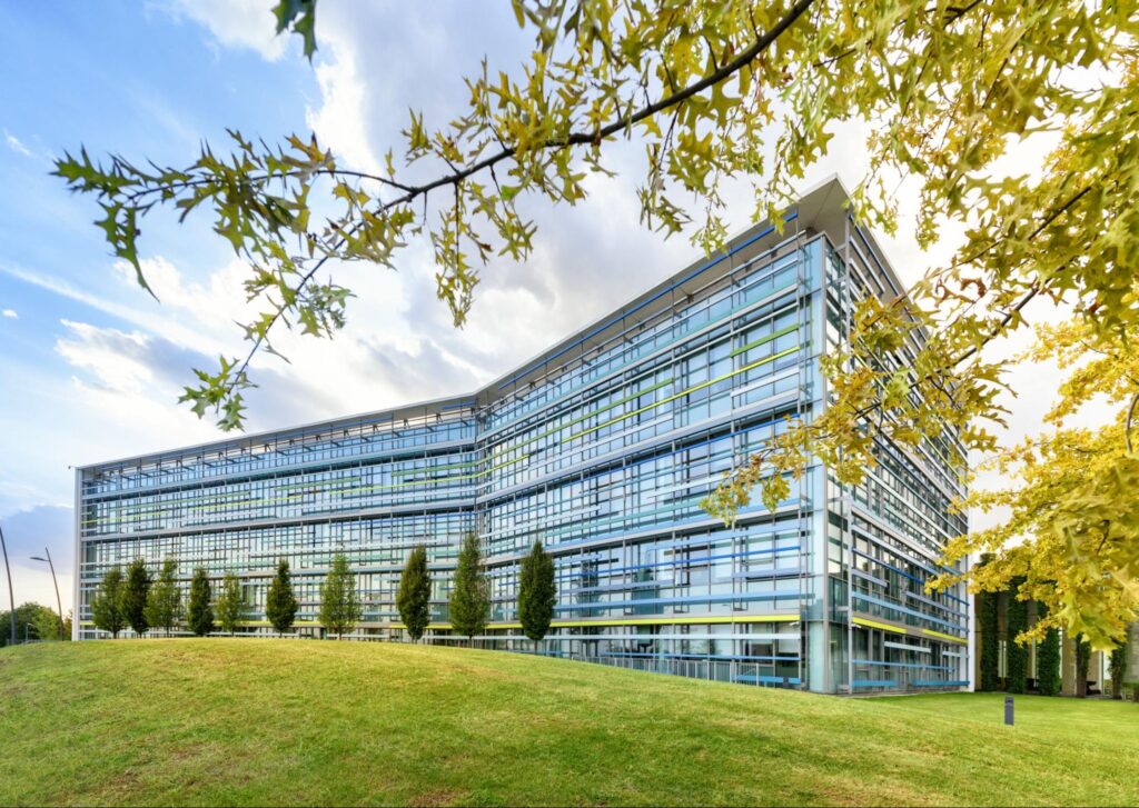 A commercial office building in Land O' Lakes, Florida, with modern architecture and green landscaping, reflecting the area's business growth.