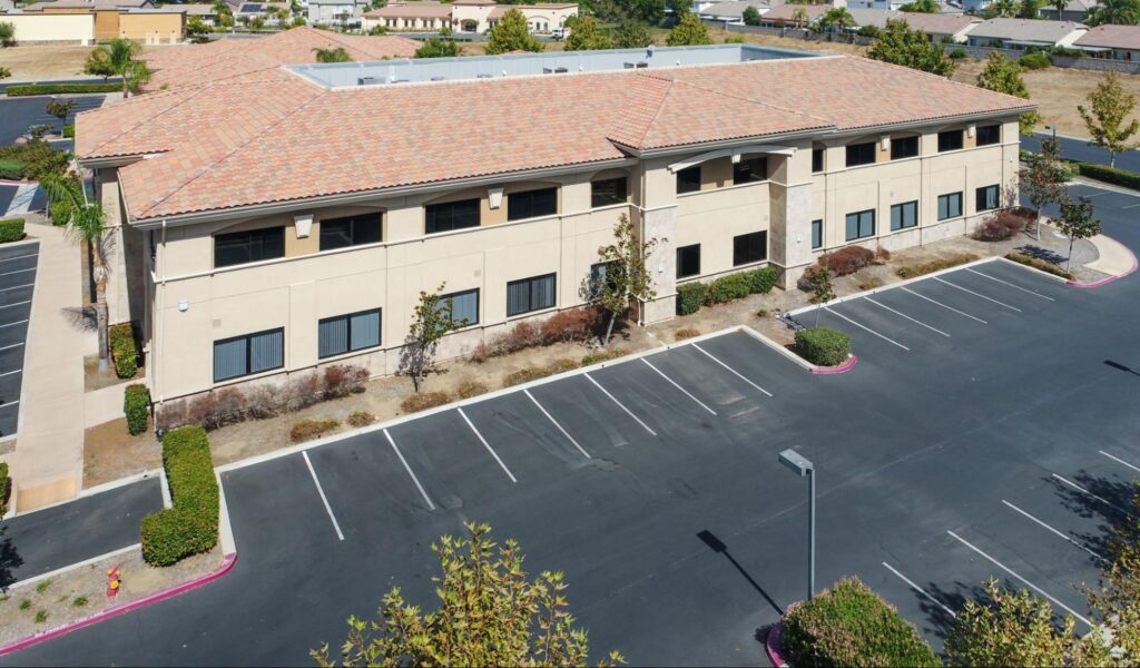 A well-planned business park in Land O’ Lakes with multiple office buildings, ample parking, and pedestrian-friendly spaces, catering to modern workplace needs