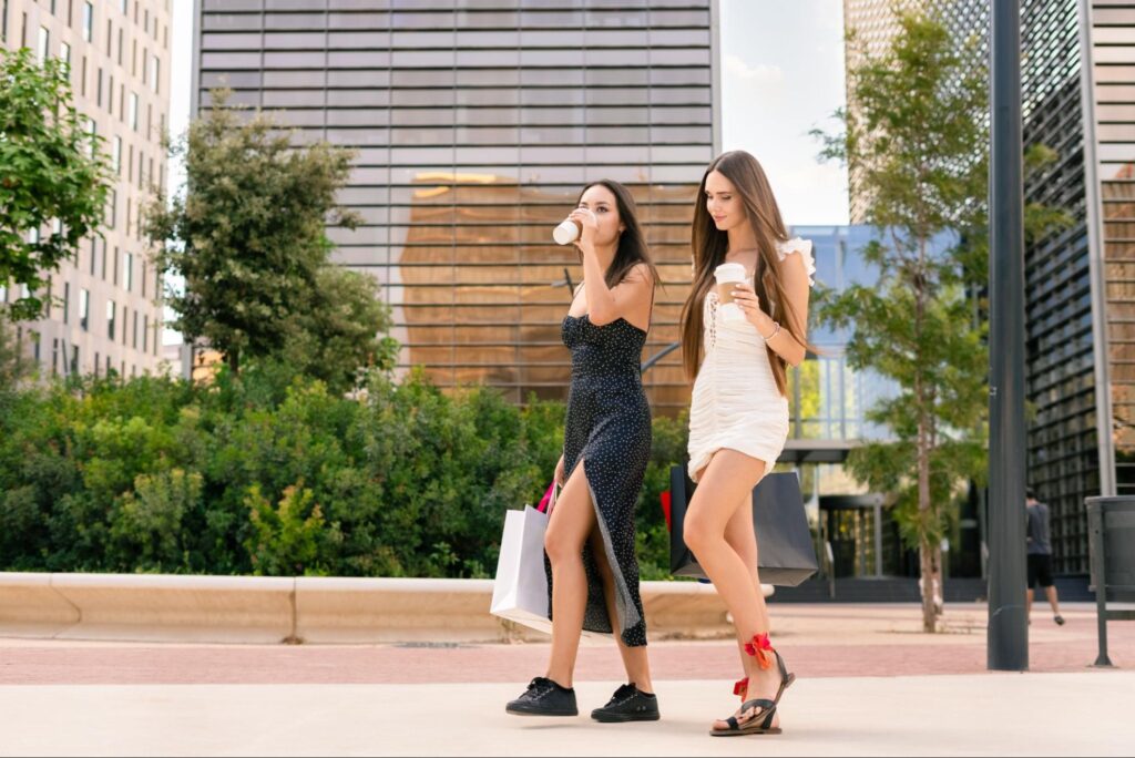 A contemporary mixed-use development in Land O' Lakes, Florida, displaying street-level retail shops with residential units above, reflecting the growing trend of integrated living spaces.