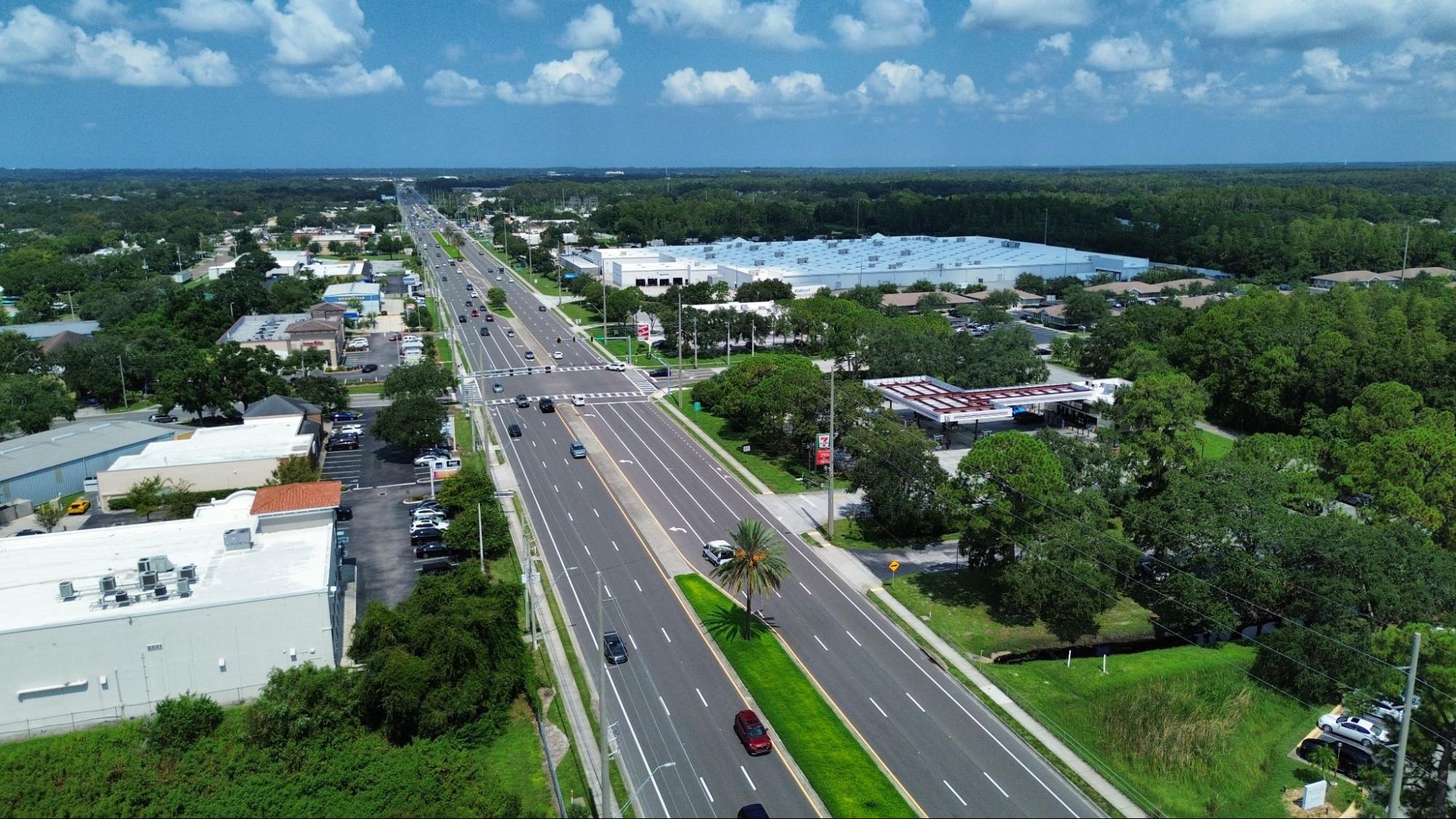 Aerial view of a commercial corridor in Tampa Florida showing retail and industrial properties representing the market environment brokers operate in